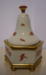 Box with a lid in the shape of pagodas