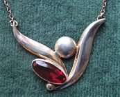 Silver necklace with pink and purple stones