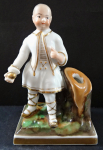 Figurine Chinese boy with a ball - stand