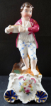 Barefoot boy with a bowl on a pedestal