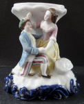 Small stand with man and girl