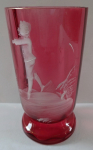 Pink glass with white boy figure