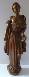 Wooden gilded statue of an ancient girl