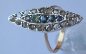 Gold and silver ring with colored stones and diamond