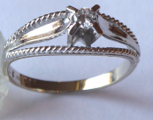Ring made of white gold with brilliant