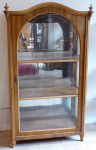 Walnut showcase, with arch and etched glass