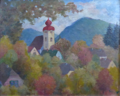 Autumn in small town with a church tower and hills