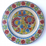 Wooden plate with painted colorful flowers
