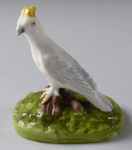 White bird with a yellow crown - porcelain miniature