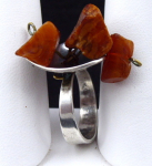 Silver ring with three natural amber