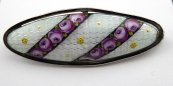 Silver oval brooch with colored enamel and roses