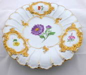 Meissen plate with golden cartouches and painted flowers