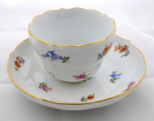 Meissen cup with saucer and coloured flowers