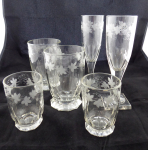 Paired glasses with vine stems