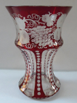Vase with vine leaves and grapes, ruby-stained glass