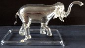 Glass figurine of a walking elephant