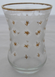 Glass with cut diamonds and gold stars