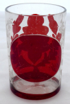 Glass with ruby staining and white painting