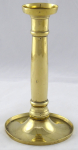 Polished brass candlestick with rings