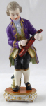 Boy tuning a violin - Passau, Germany