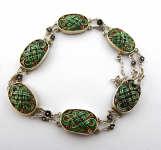 Silver bracelet with ornaments and coloured enamel