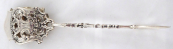 Silver tongs in rococo style