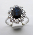 White gold ring with natural sapphire and 10 brilliant cut diamonds