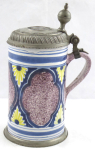 Faience tankard with cartouches and silver coin - Saxony 1756