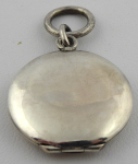 Silver round opening medallion