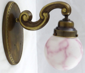 Brass lamp on the wall