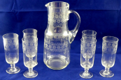 Pitcher with glasses and etched ornament