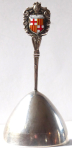 Silver small bell with the emblem of the city of Barcelona