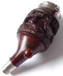 Pipe with carved deer and rope motif