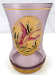 Glass with gold medallion and duck