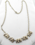 Silver necklace with elephants