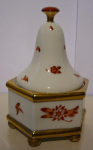 Box with a lid in the shape of pagodas
